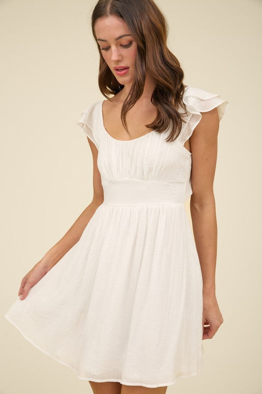 KIWI - RUFFLE TIE BACK MINI DRESS