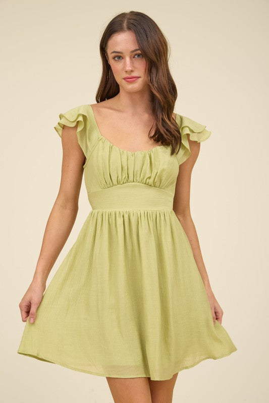 KIWI - RUFFLE TIE BACK MINI DRESS