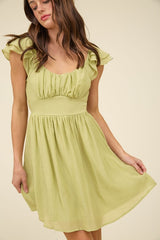 KIWI - RUFFLE TIE BACK MINI DRESS