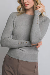CREW NECK BUTTON SLEEVE SWEATER