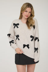 BOW PATTERNED CREW SWEATER