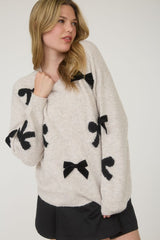 BOW PATTERNED CREW SWEATER