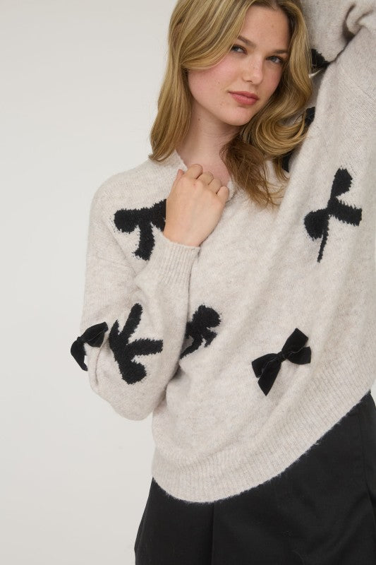 BOW PATTERNED CREW SWEATER