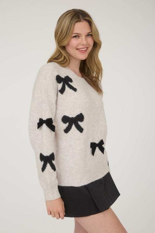 BOW PATTERNED CREW SWEATER