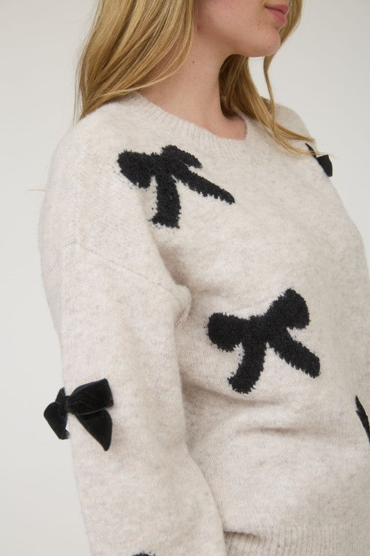 BOW PATTERNED CREW SWEATER