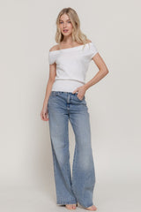 ASSYMETRICAL SHORT SLEEVE SWEATER