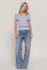 ASSYMETRICAL SHORT SLEEVE SWEATER